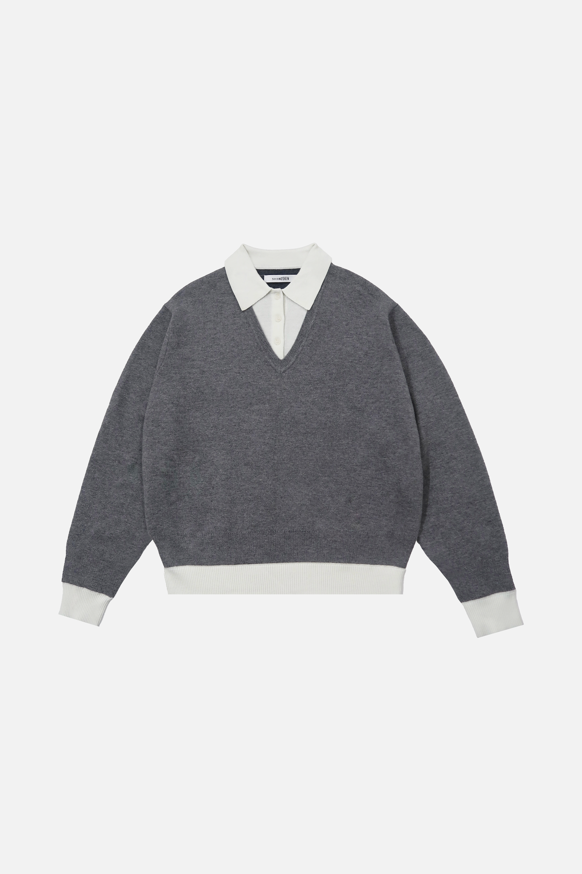 LAYERED POLO — grey-cream flatlay